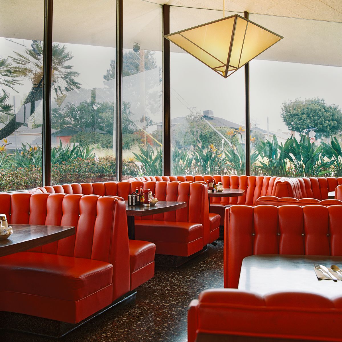 The restaurant booth is the furniture equivalent of entering a life behind the scenes